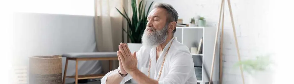 A certified Monkandú expert practicing mindful breathing