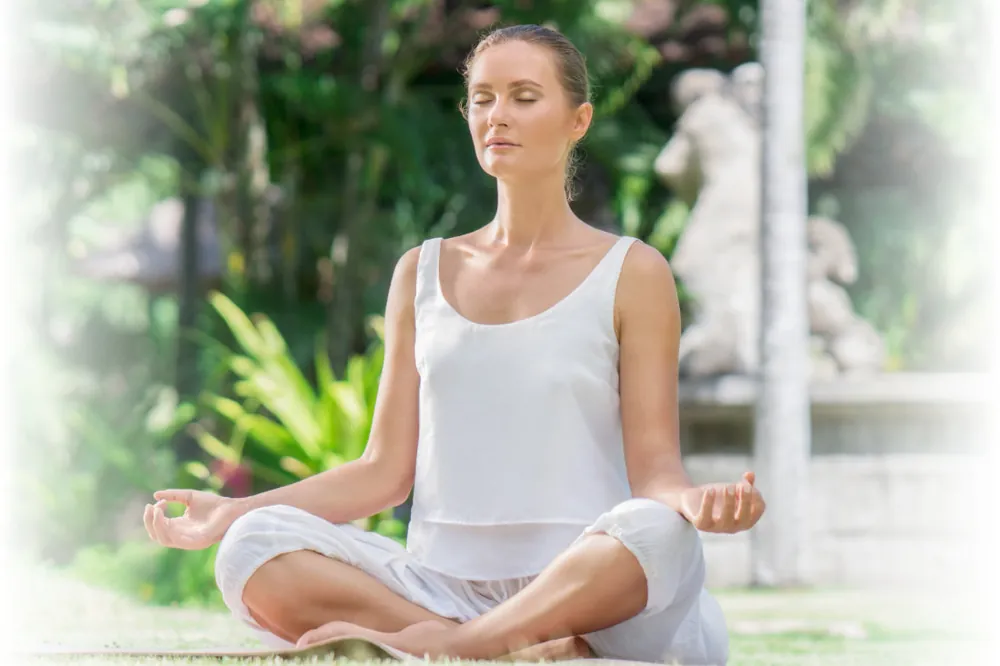 A therapist leading a guided meditation session over video call